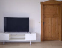 a flat screen television in a living room